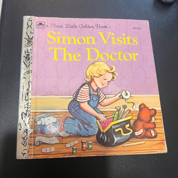 🏆📙 - Picture 1 of 1